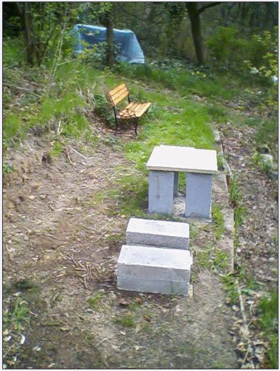 The bench is installed at the hive site.