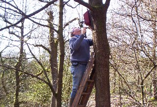 Paul installs one of the boxes.