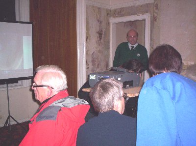 Setting up the overhead projector.