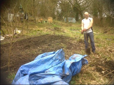 Jay Quinn helps remove the tarpaulin after Winter.