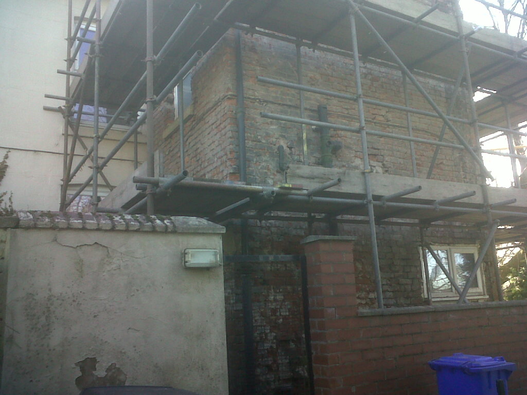 Exposed brickwork before rendering.