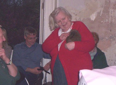 Barbara shows off her oldest resident,a common UK hedgehog.